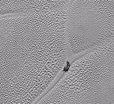 Межпланетная станция «Новые горизонты» передала сама детализированные фотографии Плутона